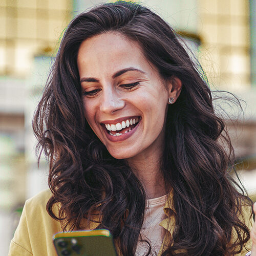 Smiling patient reviewing flexible financing options at JW Dental Phoenixville